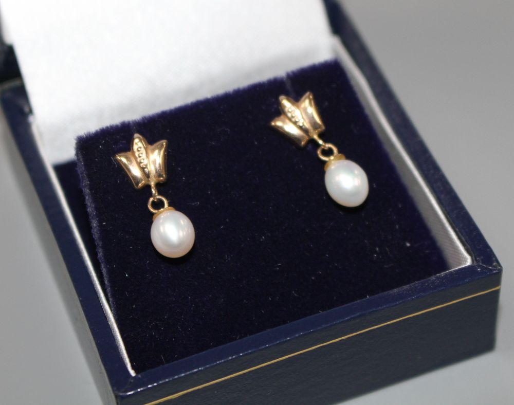 A modern pair of 375 and cultured pearl set drop earrings, 14mm